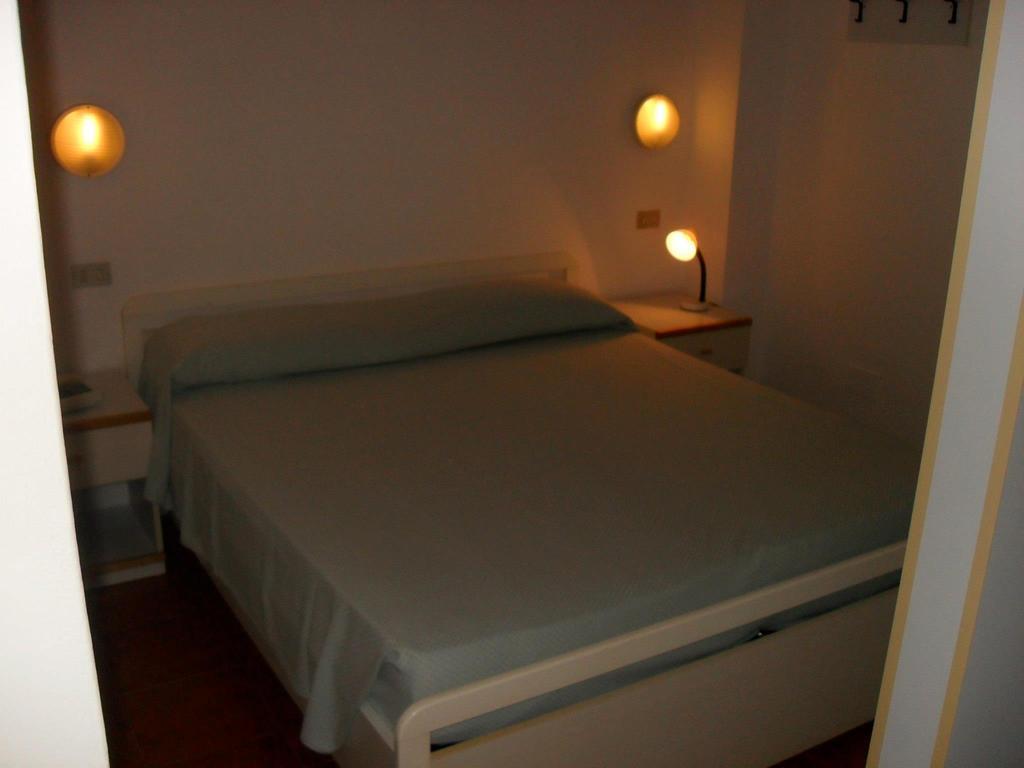 Casa Del Golfo Aparthotel Lacona Ruang foto