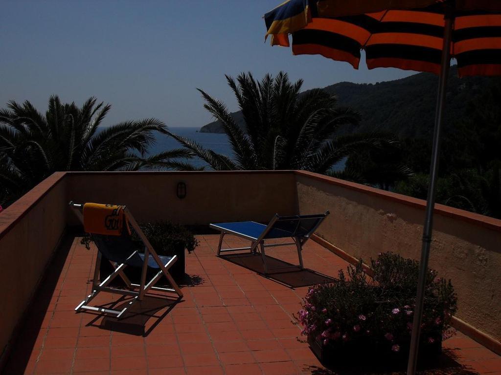 Casa Del Golfo Aparthotel Lacona Ruang foto