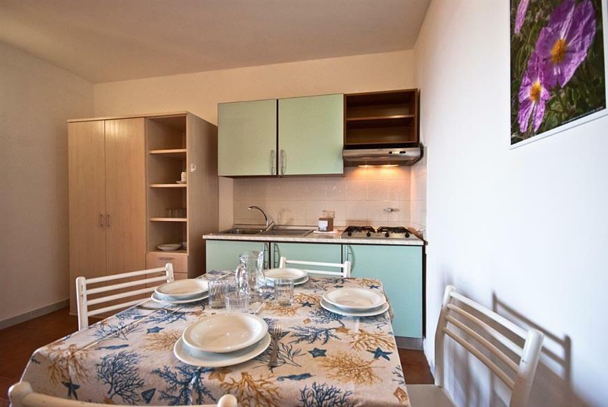 Casa Del Golfo Aparthotel Lacona Bagian luar foto